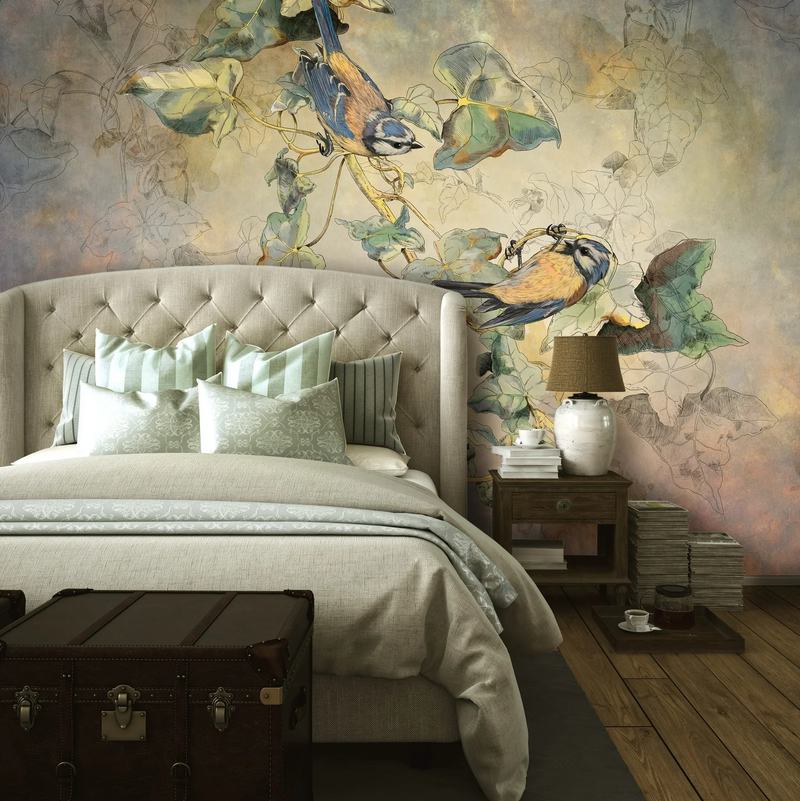 Bedroom feature wall hung with a bird and foliage mural wallpaper